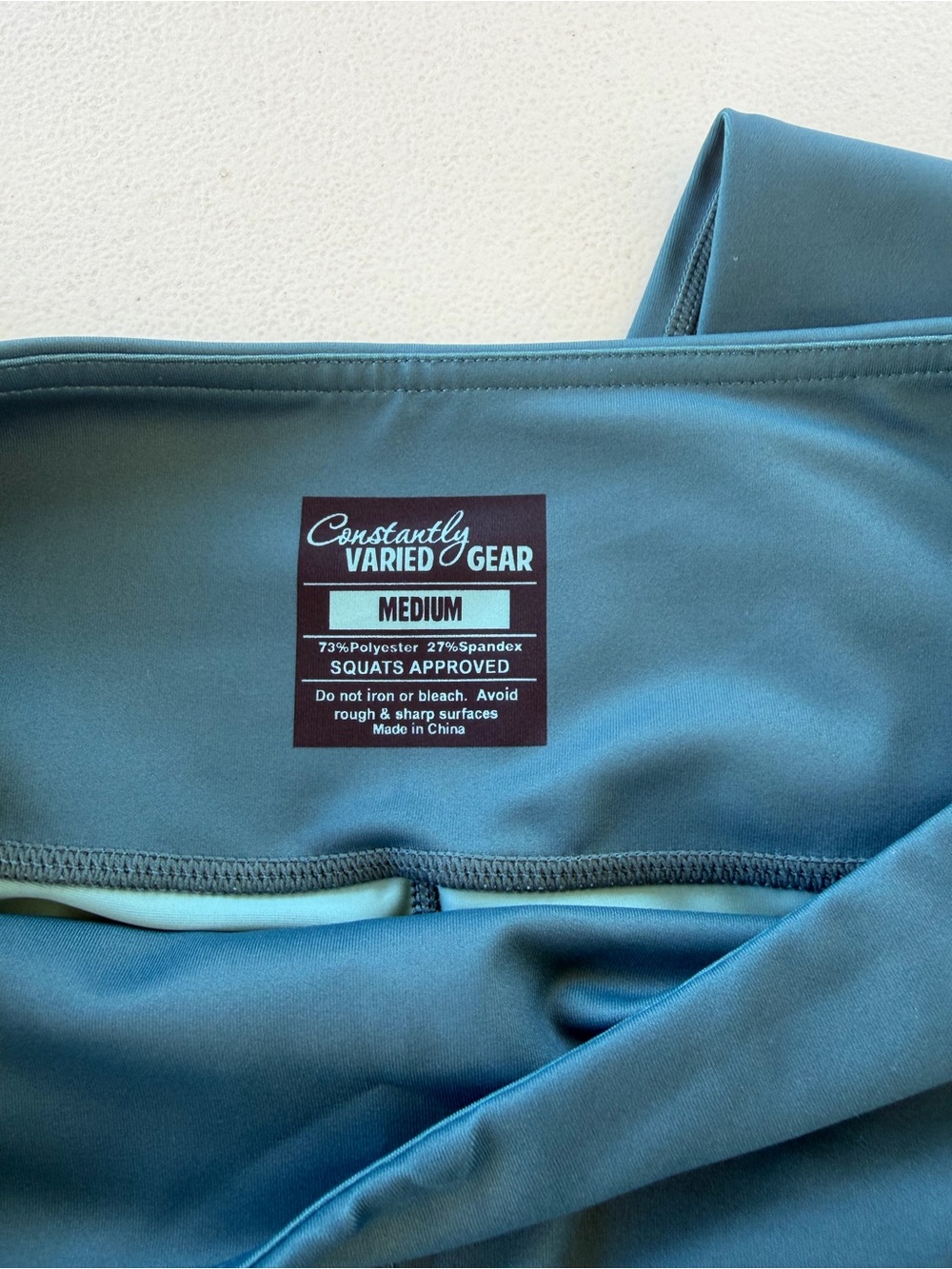 Constantly Varied Gear Teal Leggings with Navy Leaf Motif - Picture 7 of 8